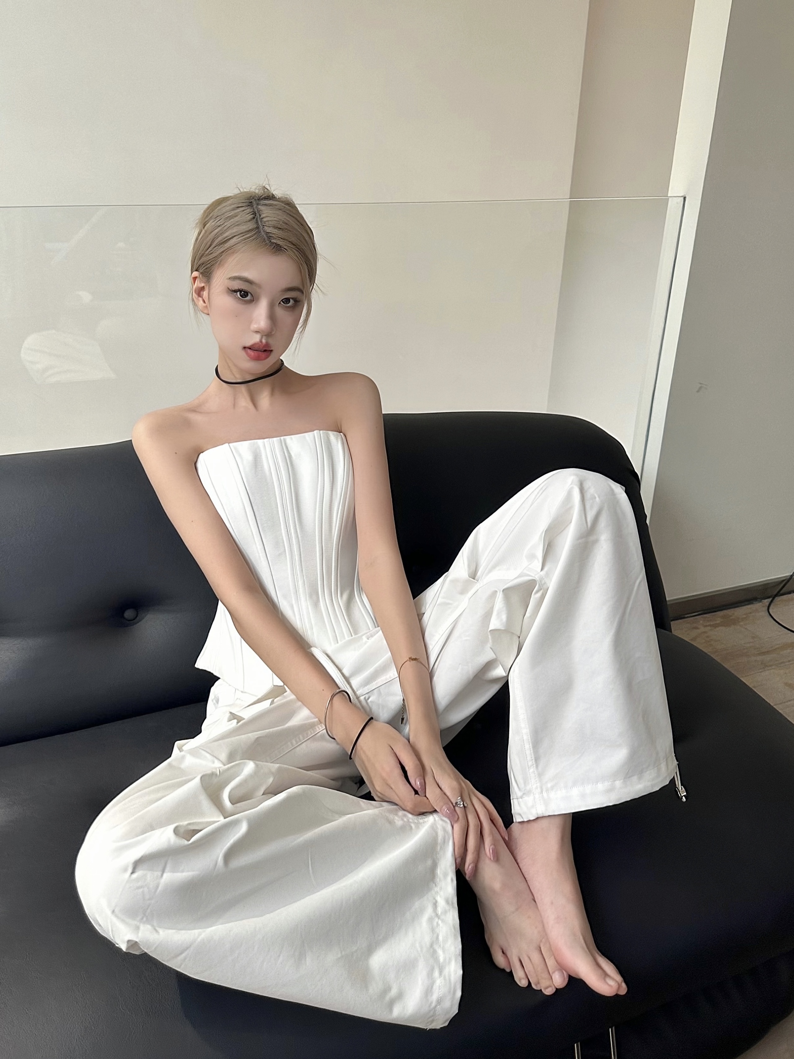 Black and White Fishbone Strapless Top with Waist-Cinching Design and Straight-Leg Parachute Pants for Cool Y2K Workwear Style