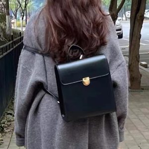 Retro Casual Black Leather Backpack for Women - Minimalist Travel Commuter Bag with Artistic Design