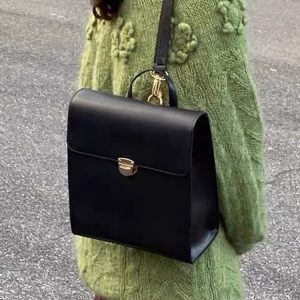 Retro Casual Black Leather Backpack for Women - Minimalist Travel Commuter Bag with Artistic Design